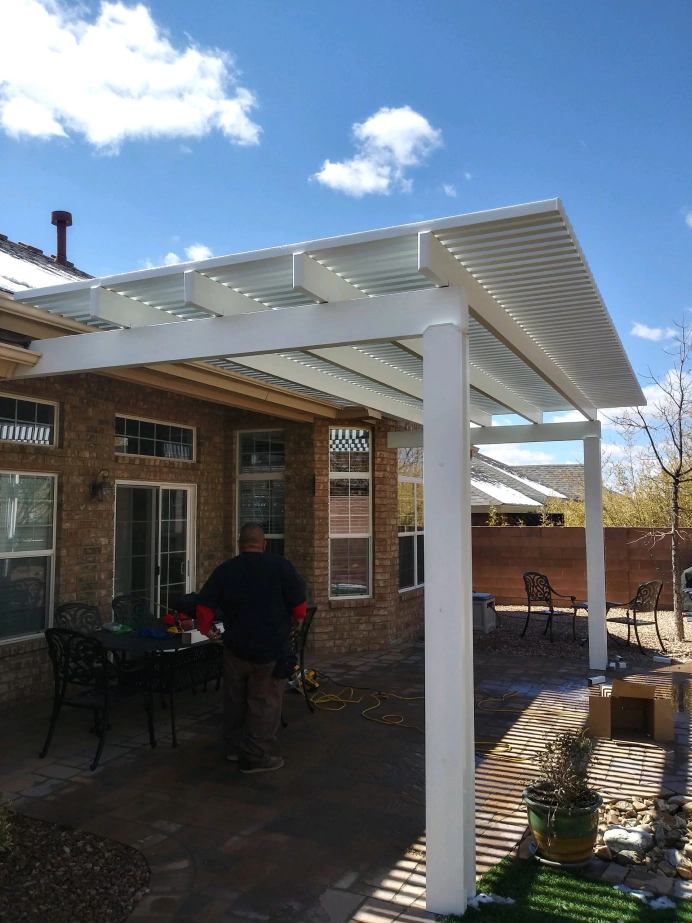 Modern aluminum pergola over a backyard patio in Albuquerque, NM