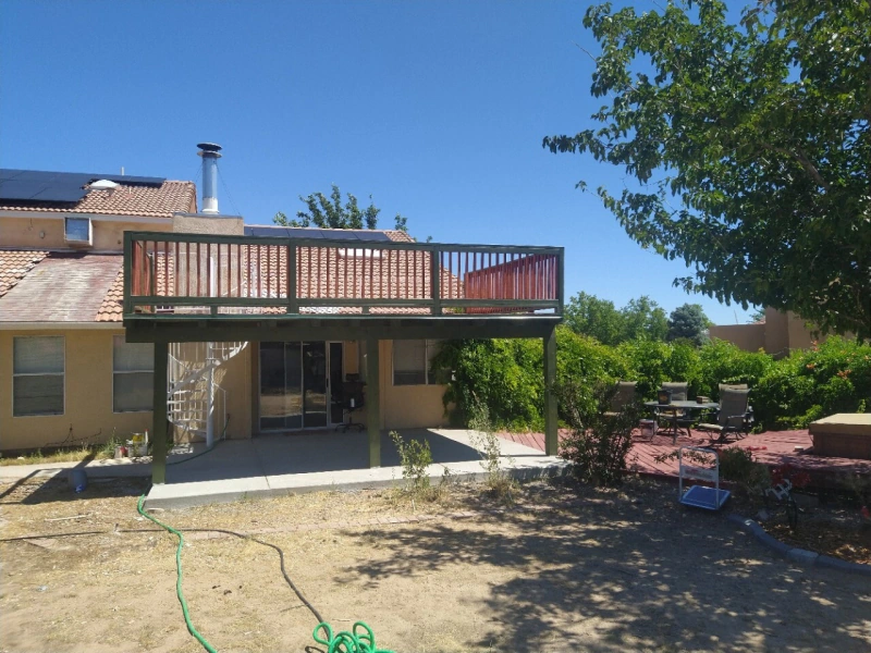 Elevated wood deck with railing built in Albuquerque, NM