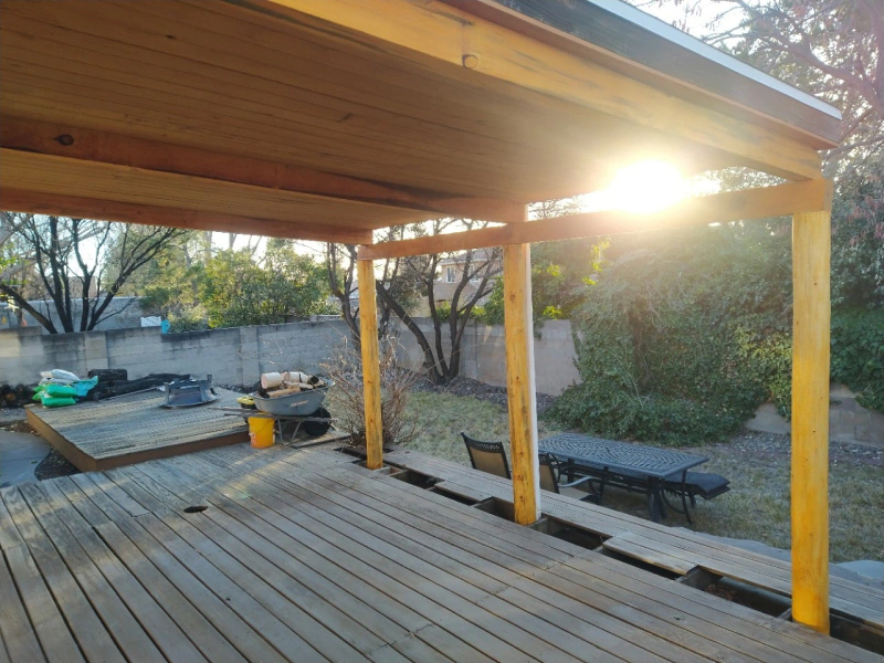 Wood patio cover extending a home's living space outdoors in Albuquerque