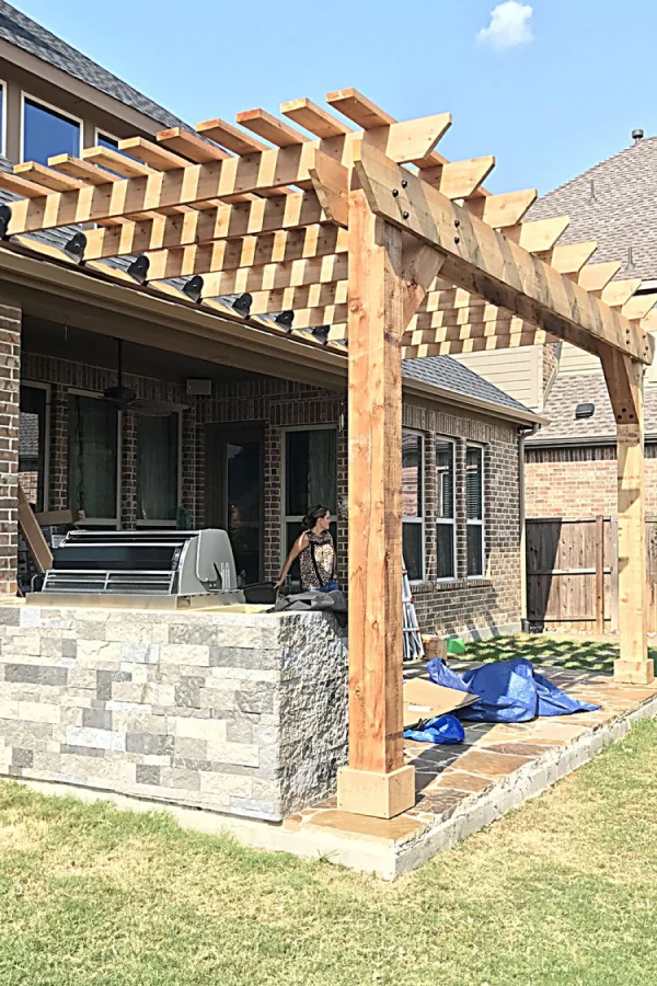 Custom wood pergola over a backyard patio in Albuquerque, NM