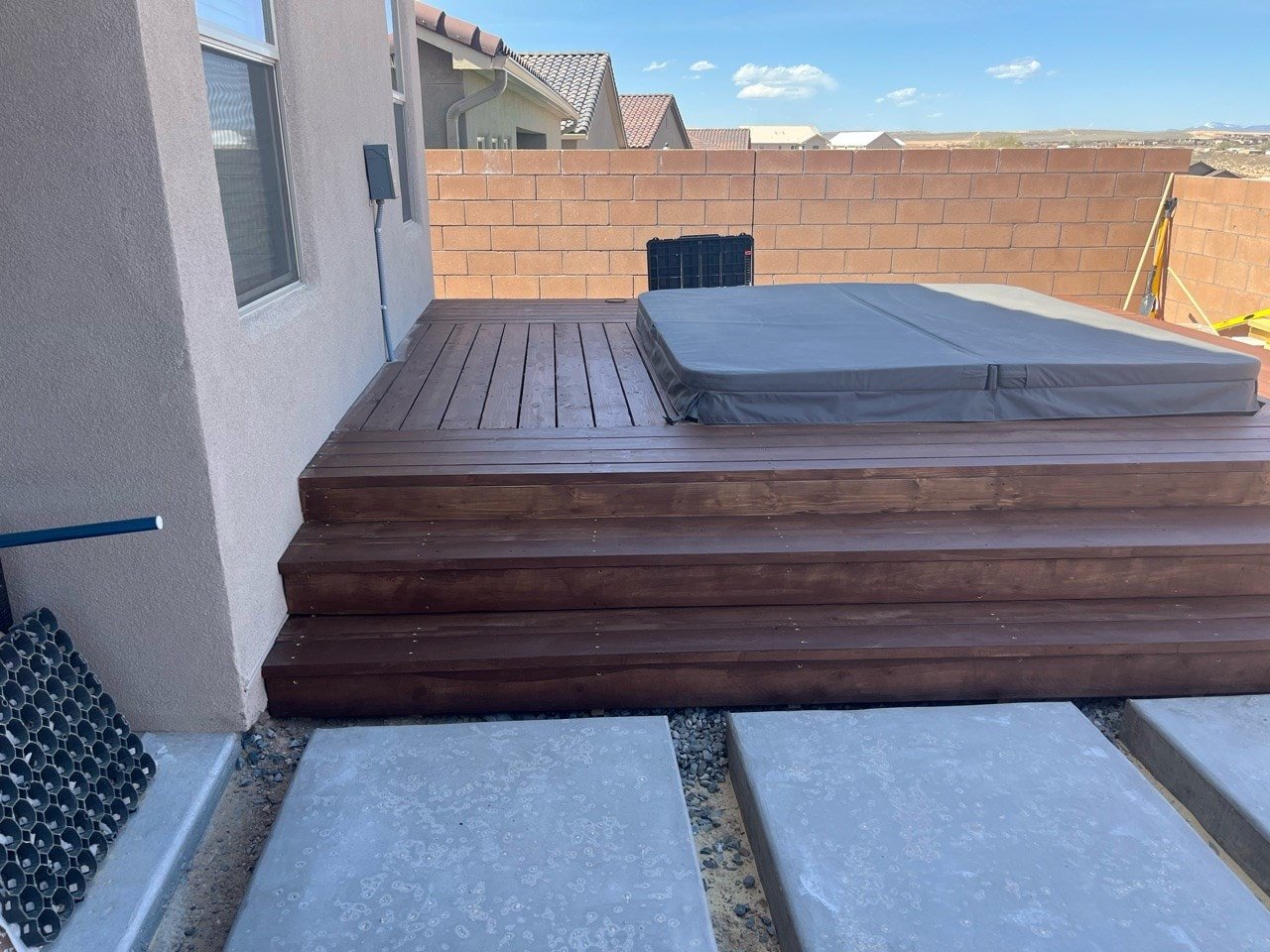 Finished wood deck build in an Albuquerque backyard